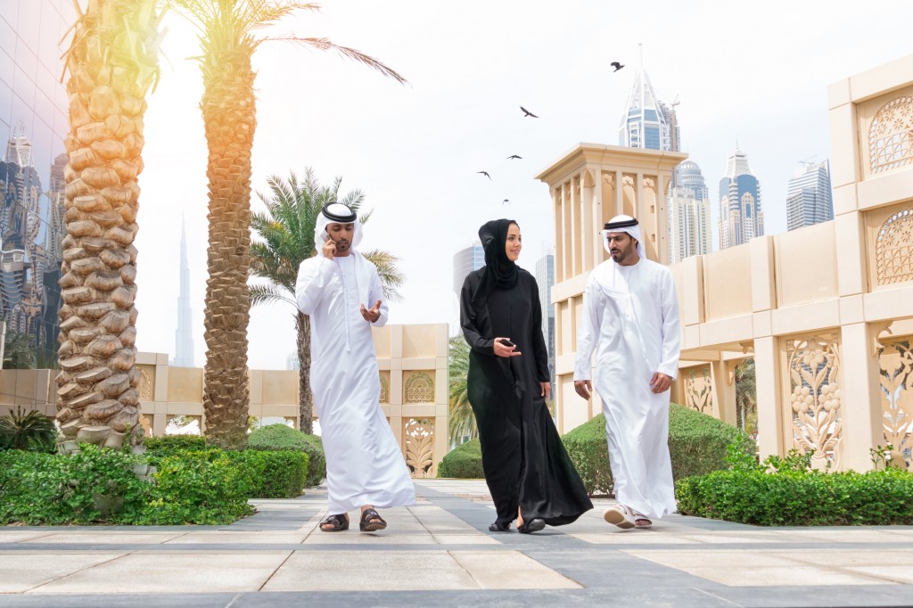 Three arab business people outside