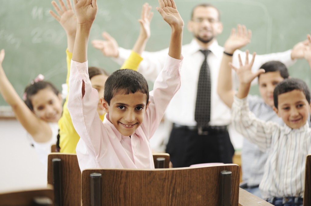 Education activities in classroom at school, happy children learning