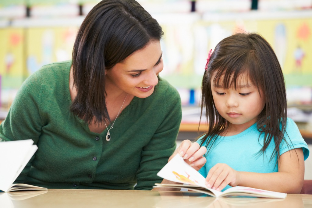 Teacher with asian students