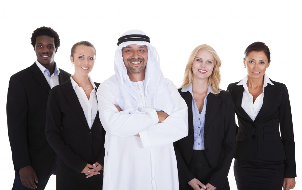 Arabic Man Standing With Businesspeople